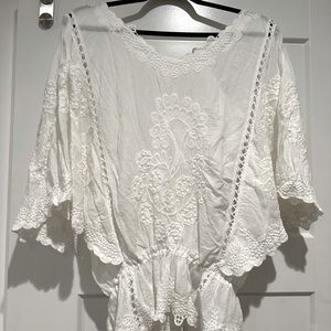 Beautiful white embroidery shirt with wing sleeves and elastic waist